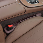 Side angle of the car seat gap stopper showing the wedge body and raised tray rim