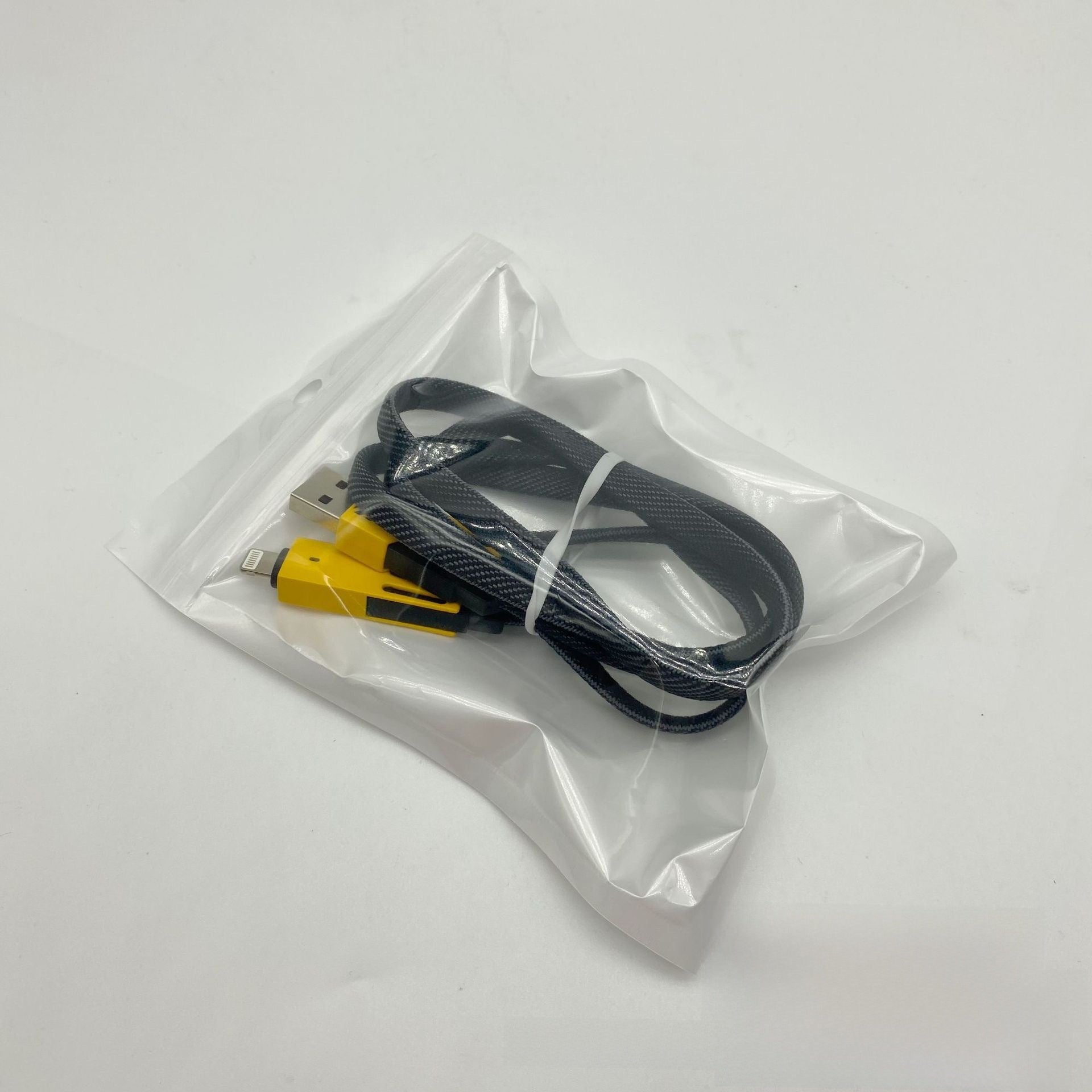 Flat braided cable with the yellow shells and grey slotted collars in view