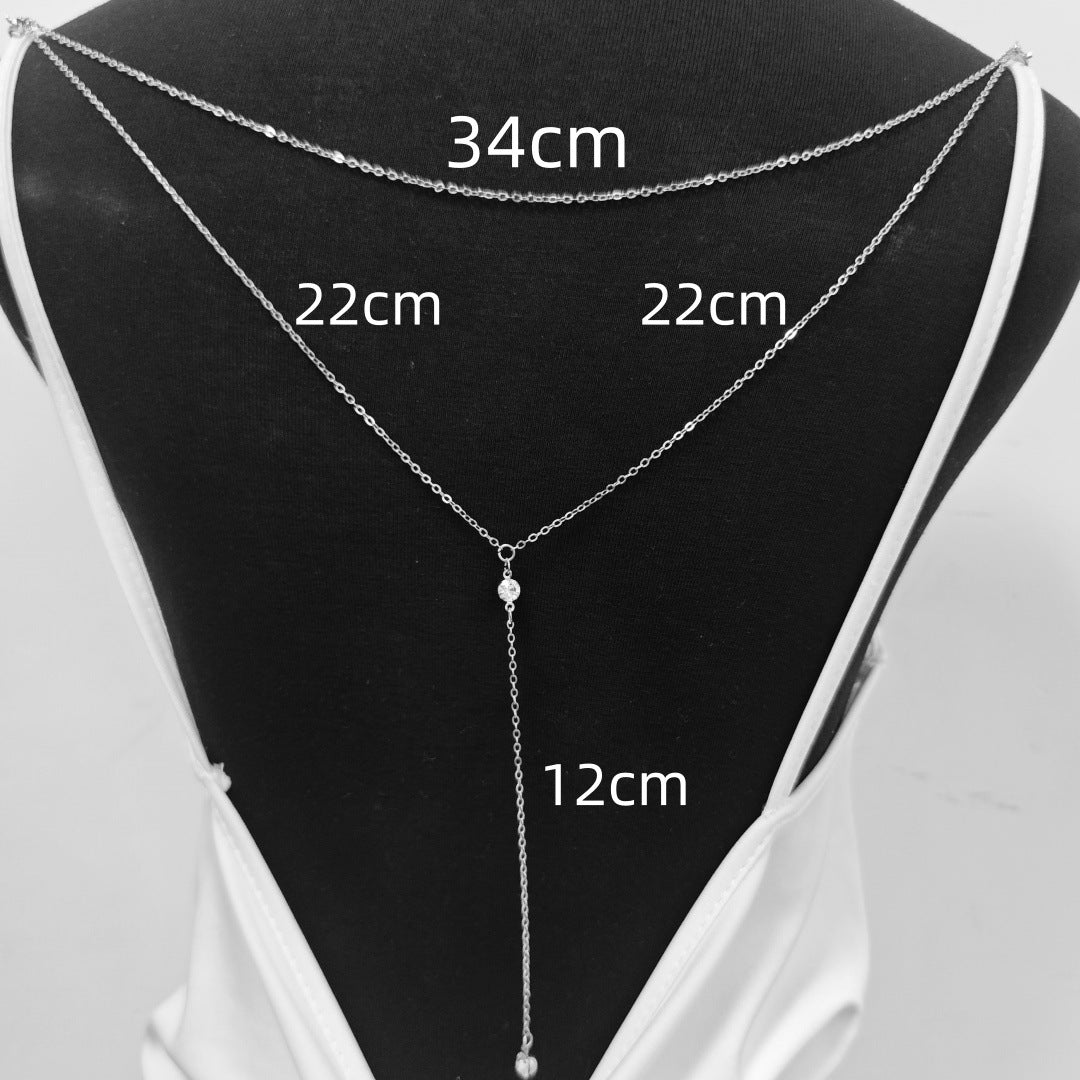 Gold rhinestone lariat necklace showing the two graduated chain layers