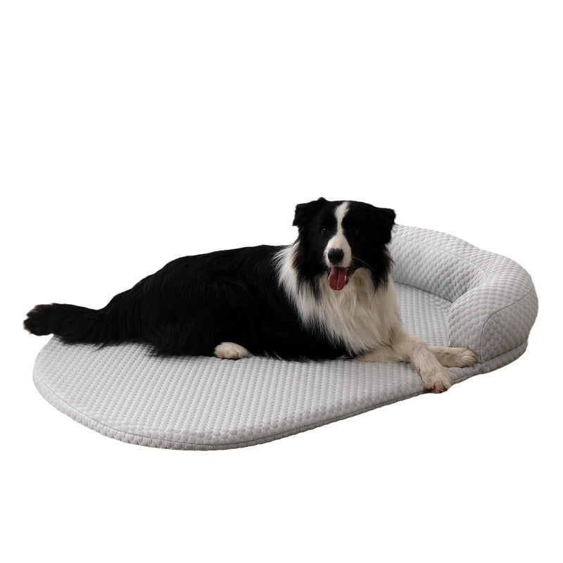 Pet cool mat shown flat, pea textured cool touch polyester cover with a bolster edge