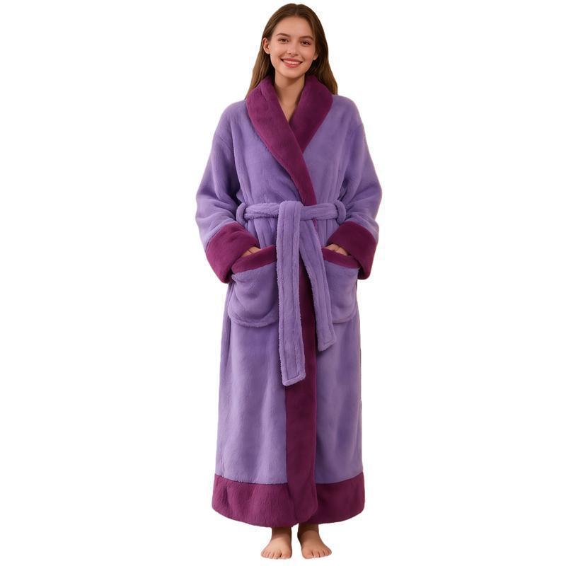 Woman wearing a long purple flannel bathrobe with a plum shawl collar, cuffs and hem, purple variant