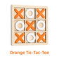 Orange set wooden tic tac toe board game, orange crosses and white rings in a natural wood grid