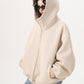 Side view of the air layer knit zip hoodie with dropped shoulders and roomy sleeves