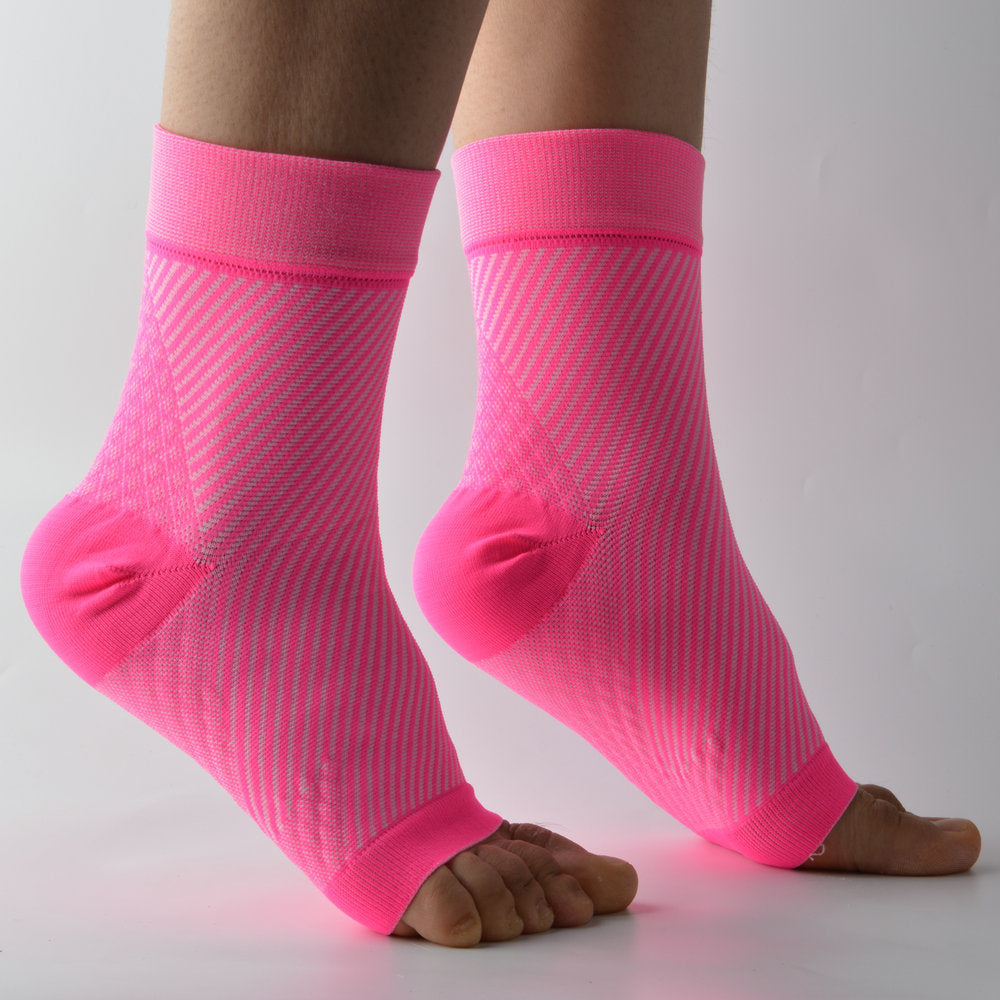 Black diagonal knit foot compression sleeves worn front on, open toe and heel, firmer under arch band