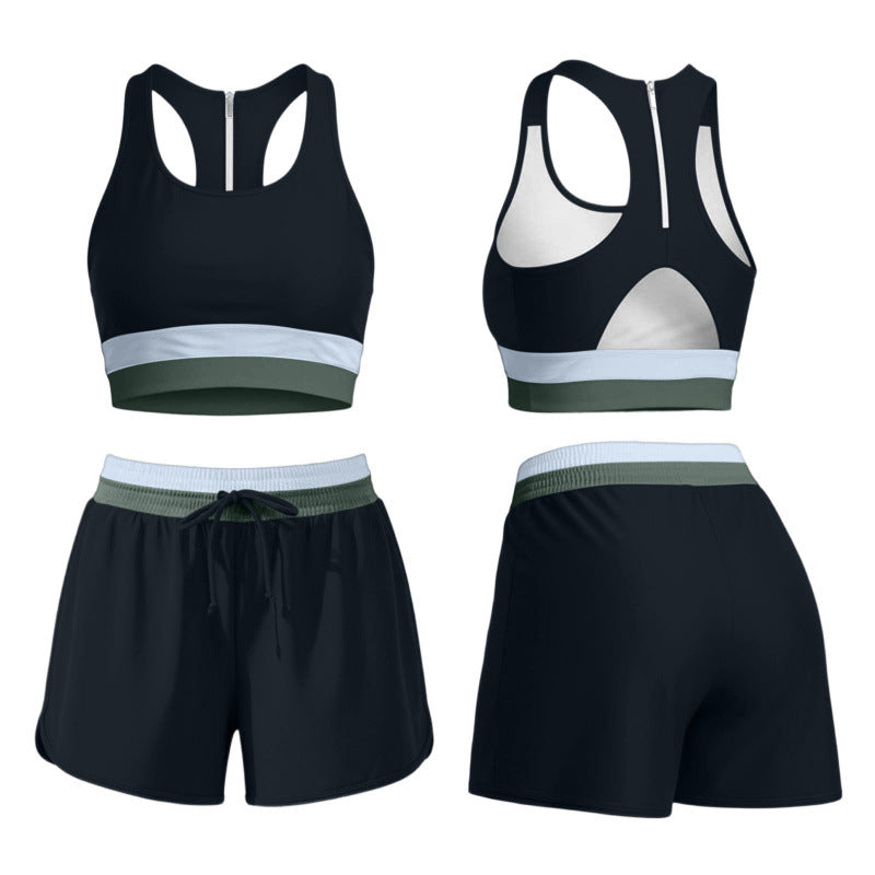 Racerback swim tank top with a cream and bright color block band across the hem, close athletic fit