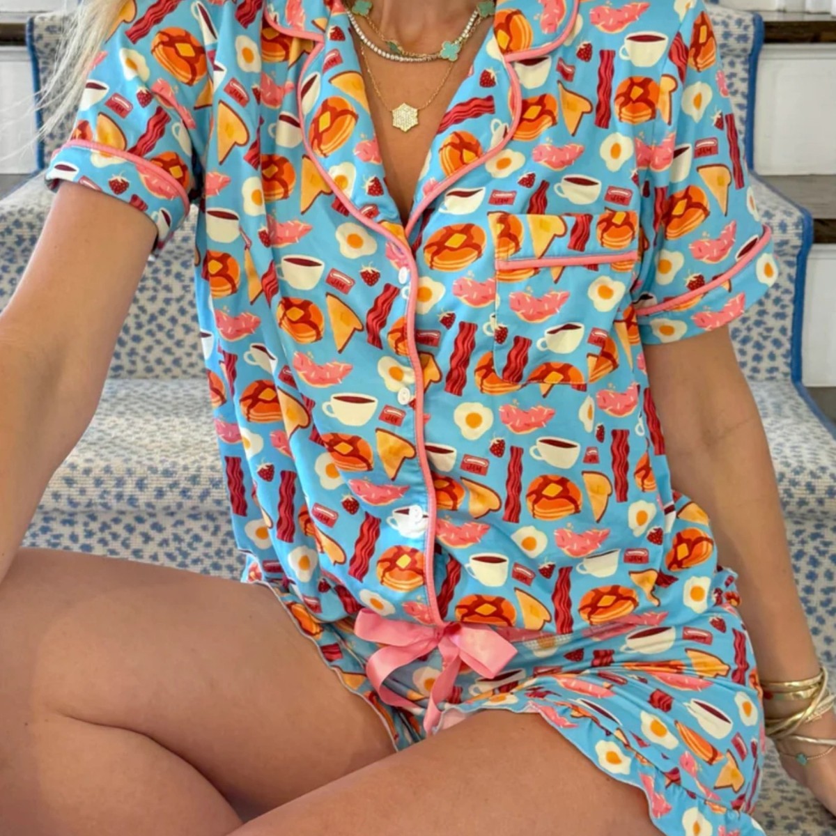 Milk silk top and ruffle shorts styled together as a coordinated set