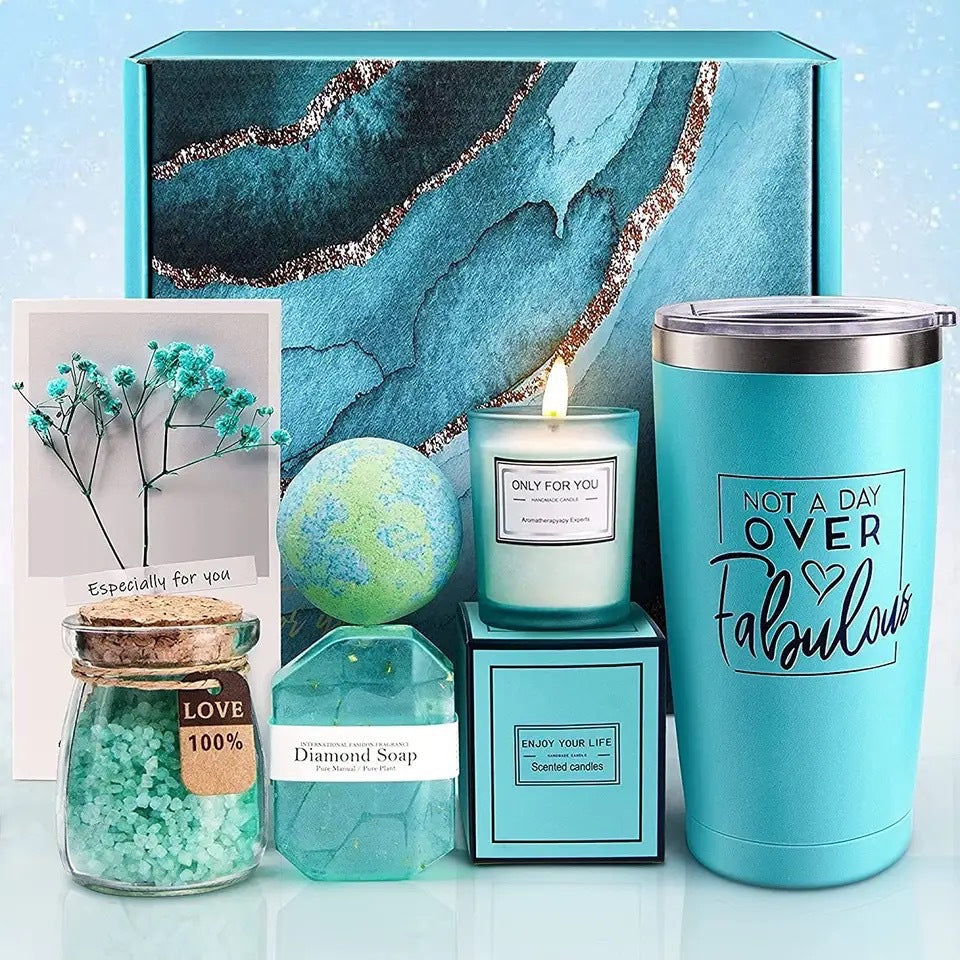 Teal bluebell bath gift box with a bath bomb, diamond soap, a scented candle and an insulated tumbler