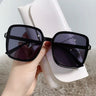 Black frame dark grey lens