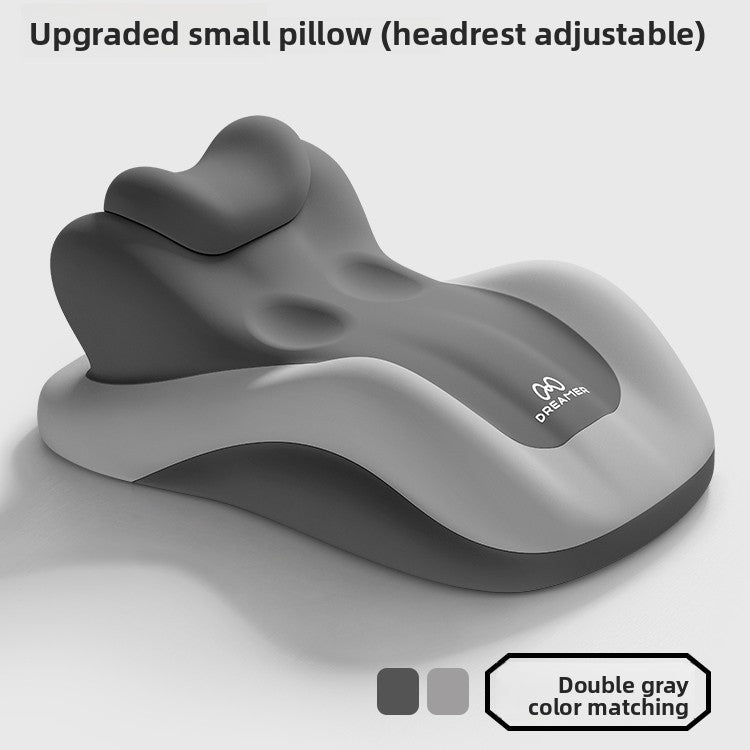 Two tone gray molded foam lounge pillow with a small headrest