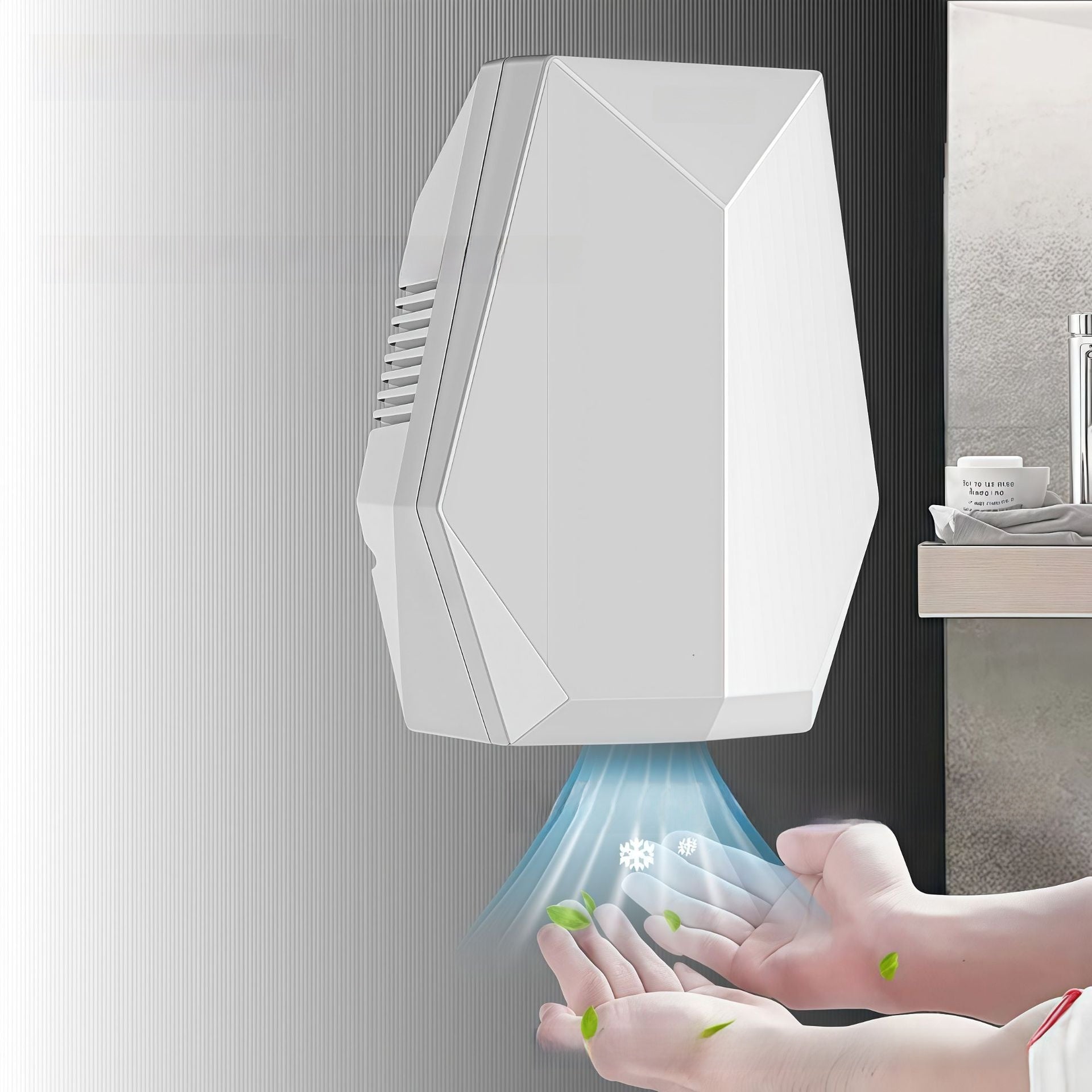 White automatic hand dryer mounted on a wall drying a pair of hands