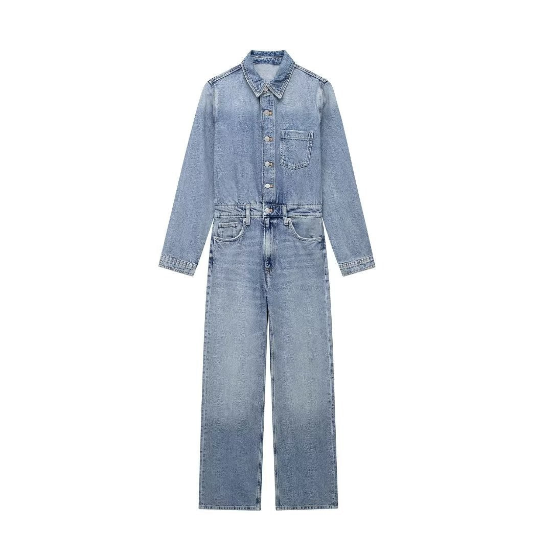 Flat front view of a light wash denim jumpsuit with button front, chest pocket and straight legs