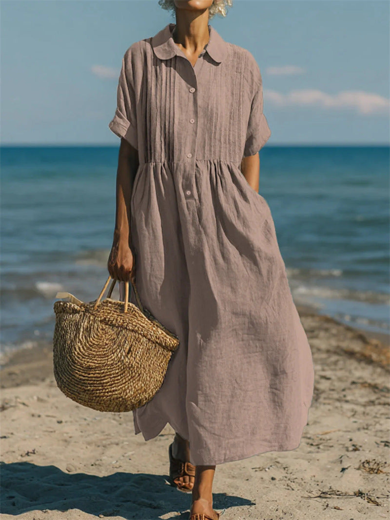 Short-sleeve cotton linen dress shown in a bright daytime room