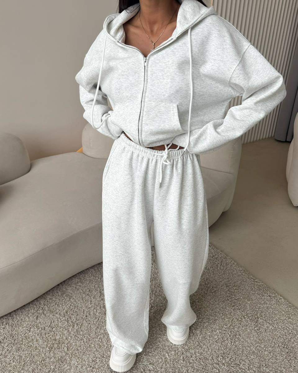 Light gray zip front hooded sweatshirt and wide leg trousers set, Light gray color, worn by a model, the Size M option
