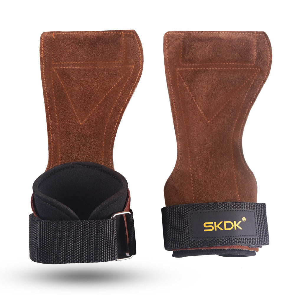 Leather palm pad of a gym hand grip shown against a white background