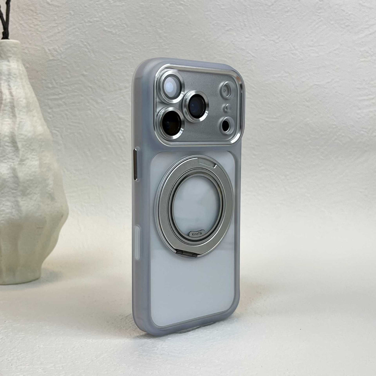 Frosted clear phone case with silver-tone ring stand, variant photo for iPhone 17 Pro Max