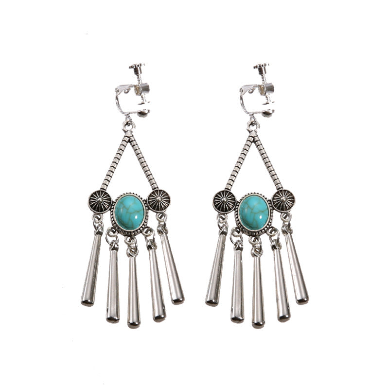 Handmade bohemian clip-on earrings with tassel and bead drop detail, zinc alloy frame, studio shot on white background