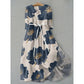 Painterly floral midi dress with a buttoned placket and self tie waist on a hanger