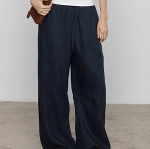 Linen wide-leg pants shown in original hemp color
