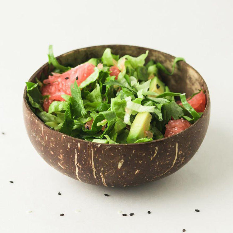 Large coconut shell bowl filled with salad, grapefruit and avocado, Large bowl option photo