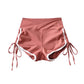 High waist contrast trim shorts photographed in natural light