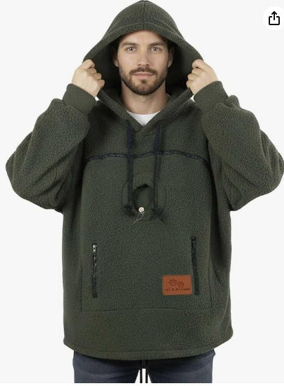 Olive green sherpa fleece pet pouch hoodie front view on a man with hand pockets