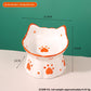 Orange rimmed cat ear ceramic raised bowl with orange paw prints, 11.5 by 11 cm and 9.5 cm high