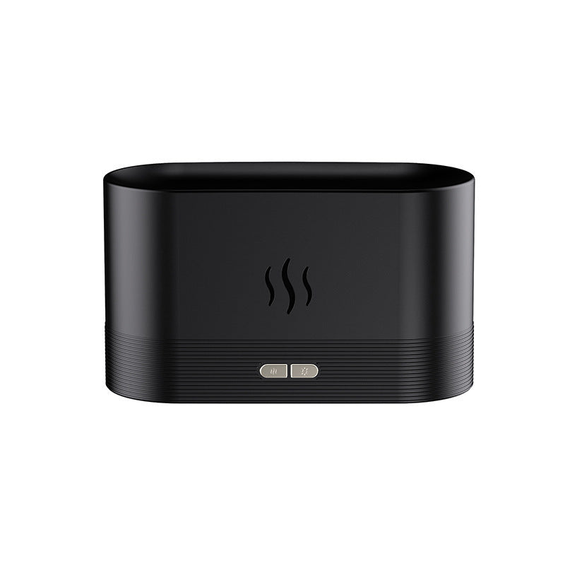 Flame effect diffuser with its warm lit mist rising like a flickering flame in a dim room