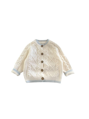 Knitted suspender baby set viewed from the side showing the knit fit