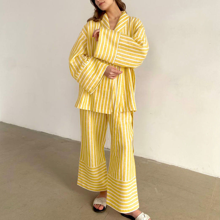 The tie-up top and high-waisted trouser set worn together as a coordinated outfit