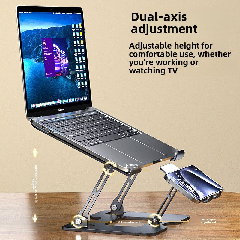 Laptop on an adjustable dual-axis stand with a phone resting in the front holder, on a wooden desk