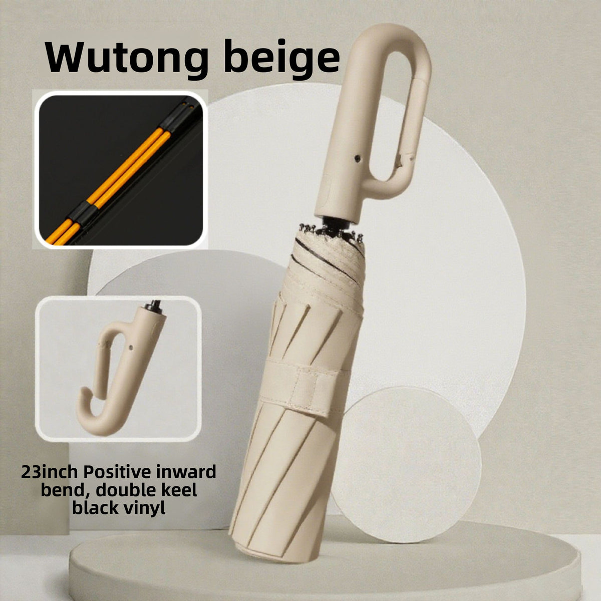 Compact folded umbrella held next to a hand for scale