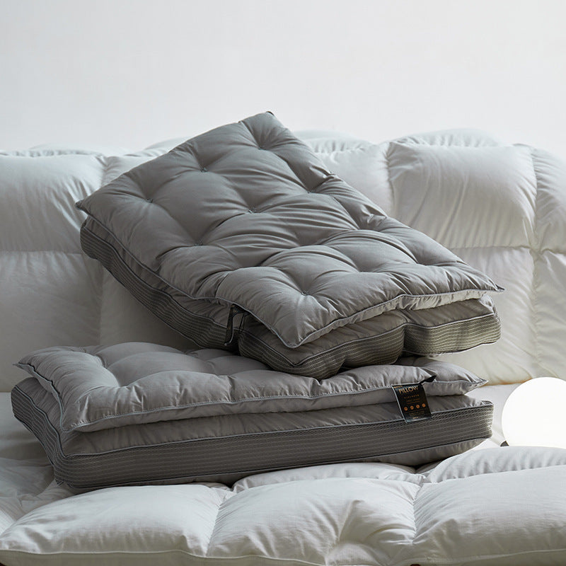 Grey quilted cotton sateen bed pillow with matching mesh gusset on bedding