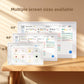 White framed digital calendar showing a colour coded family chore board on a 10.1 inch screen