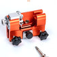 Orange aluminium chainsaw chain sharpener with the adjustment knobs and steel clamp shown