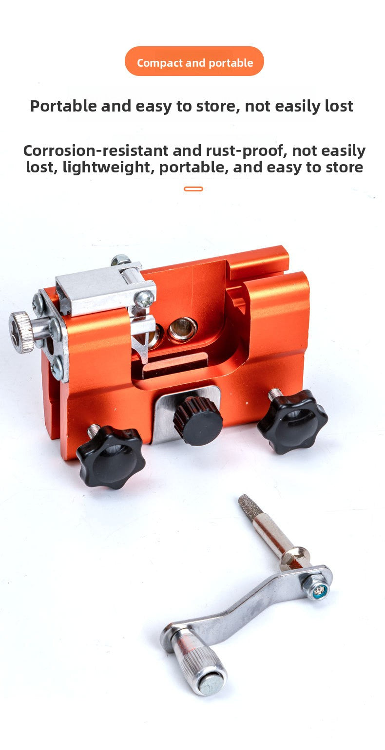 Orange aluminium chainsaw chain sharpener with the adjustment knobs and steel clamp shown