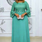 Plus size floral lace maxi dress with a flowing chiffon skirt shown on a model