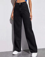 Back view showing curved yoke and patch pockets of the straight leg jeans