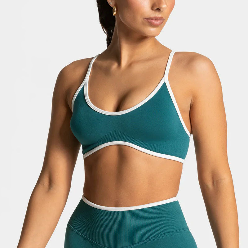 Scoop bralette with thin spaghetti straps, built-in cups and white contrast trim