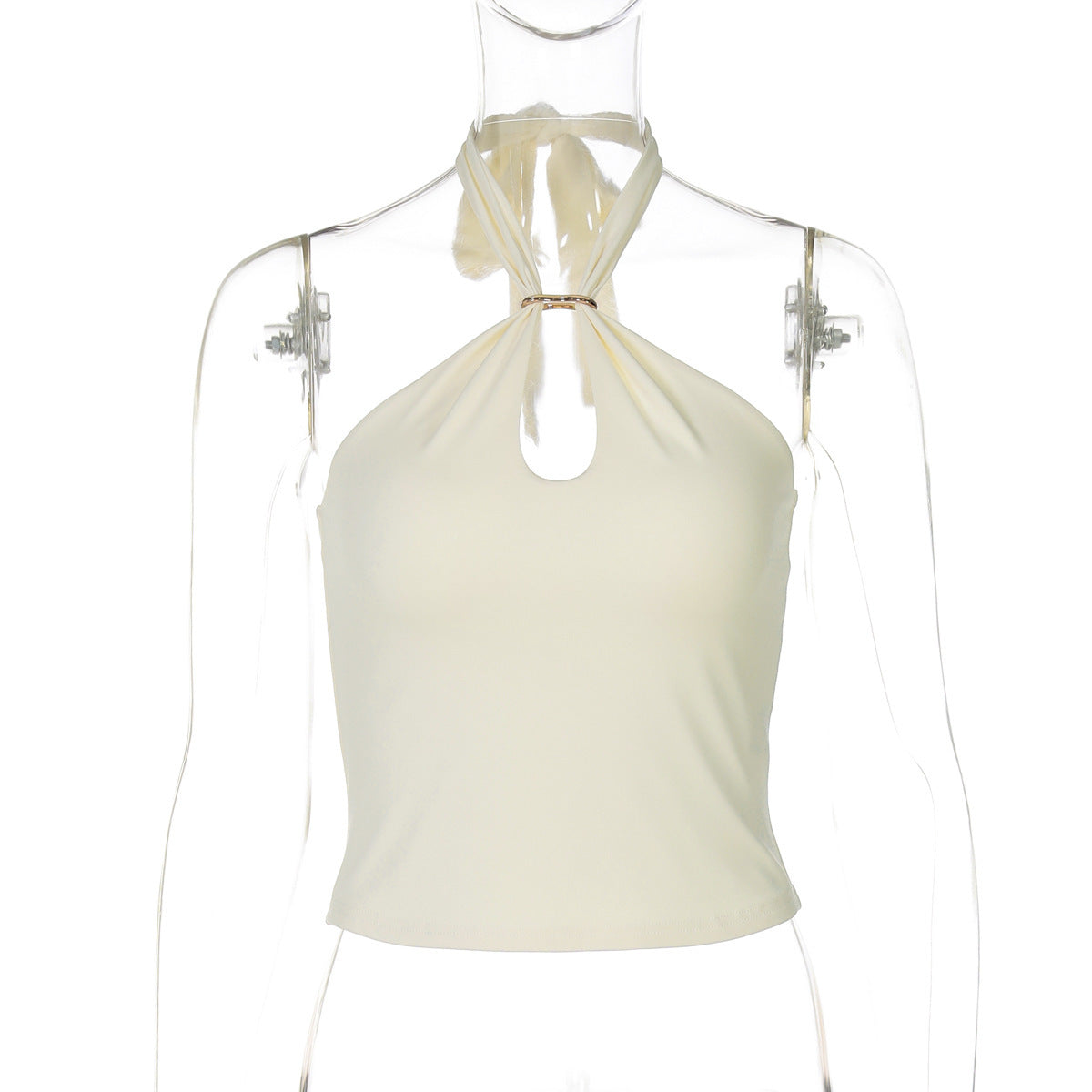 Close reference of the gold O-ring and keyhole cutout on the halter crop top