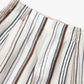 Close view of high waistband and belt loops on the striped wide leg pants