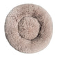 Light gray round plush pet bed with a raised bolster rim on a plain background