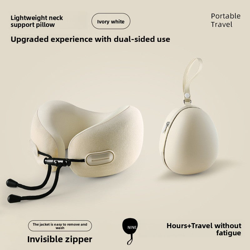 Memory foam travel neck pillow shown from the side, its U shape and toggle cinch visible