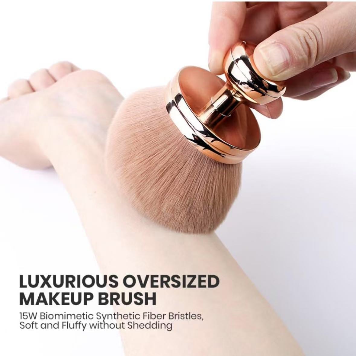 Oversized mushroom makeup brush buffing across a forearm to show softness