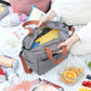 Insulated lunch bag opened to show the bright aluminium foil inner lining and padded walls