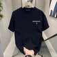 Black crew neck T-shirt with small personalremark text and a thin cross print on the chest, option photo for size 4XL