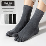 Man wearing dark gray five-toe cotton socks with black, white and gray color options shown