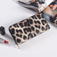 Animal print zip around long wallet with a smooth nylon lining and coin pocket