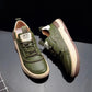 Casual lace up sneaker with flat tonal laces and a small stamped collar badge