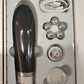 Top down view of the device on a bathroom vanity with serum