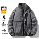 Dark gray padded bomber jacket with a fleece lined stand collar and zip front, shown with warmth feature icons